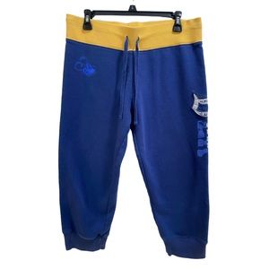 Women’s Disney Parks, Disneyland Resort Capris size Medium Blue‎ and Yellow